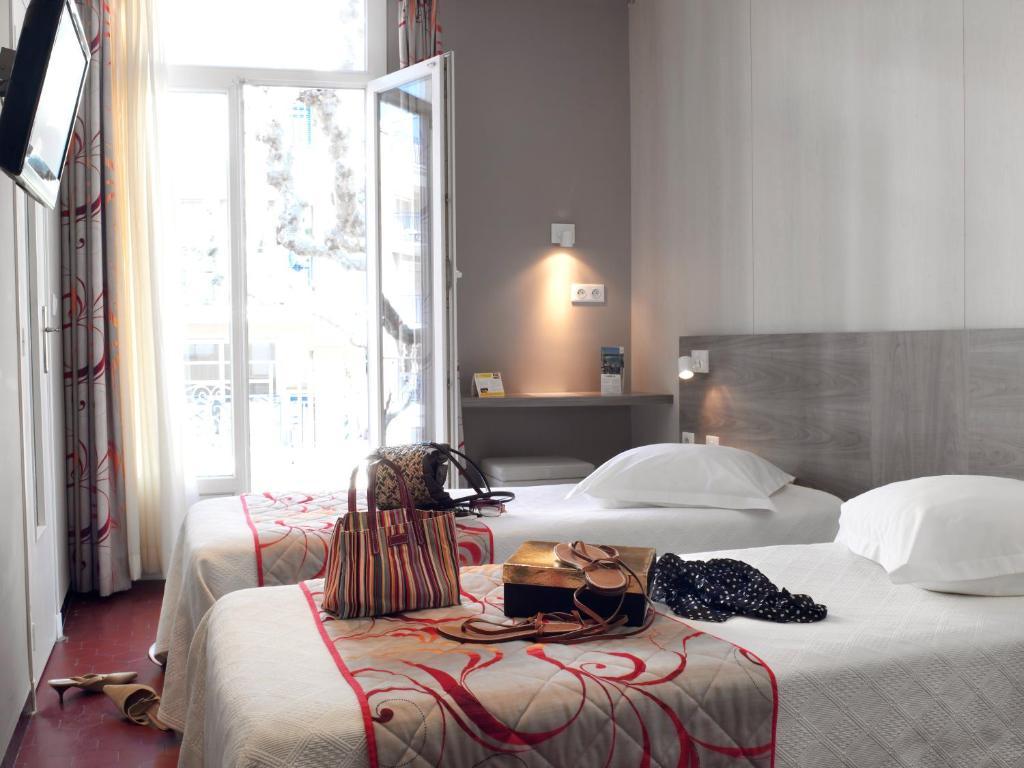 Brit Hotel Confort Le Revest Sainte-Maxime Szoba fotó